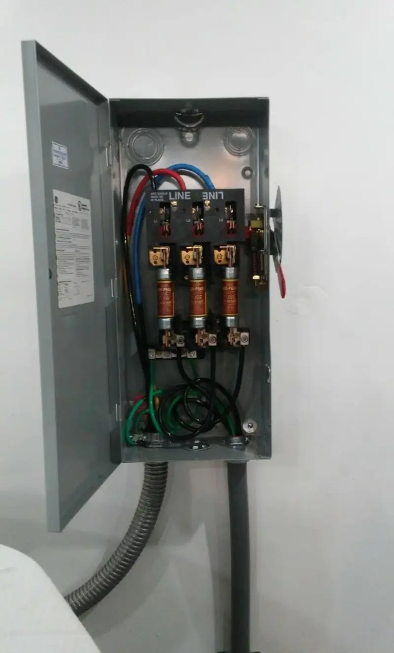 Three-phase disconnect switch installed for Smoke Detector Installation in Rocky Ford