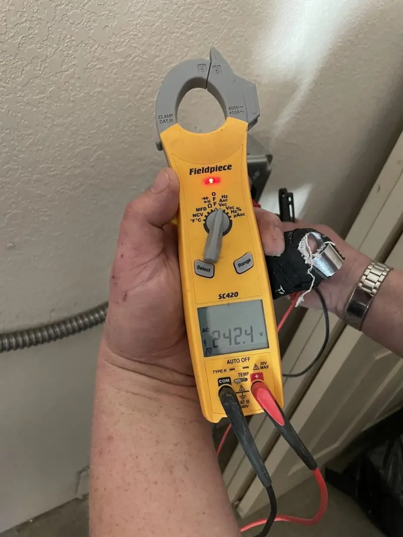 Voltage testing with clamp meter during Hot Tub / Pool Electrical Wiring in Rocky Ford